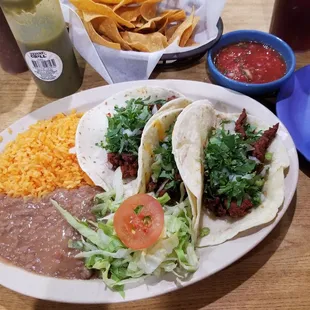 Tacos platter and chips with queso.
