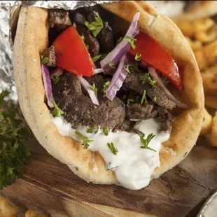 a pita filled with meat and vegetables
