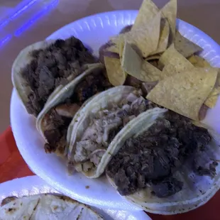 a variety of tacos and chips