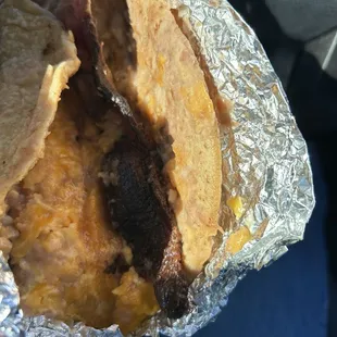 Burnt bacon on taco