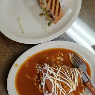 Best way to eat a torta, half normal the other half smothered in sauce, una torta ahogada