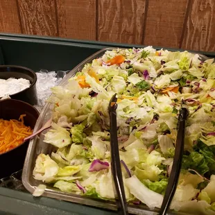 Very small salad bar offering but fresh salad is always nice.