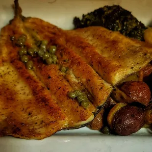 Trout main course with creamed spinach and potatoes