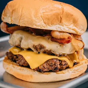 a cheeseburger with bacon and cheese