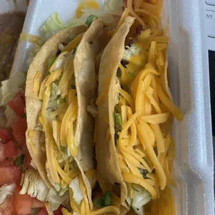 Shredded beef tacos are a must! Make it a combo for rice and beans. I was full!