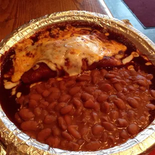 Cheese enchiladas with beans, lots of beans!