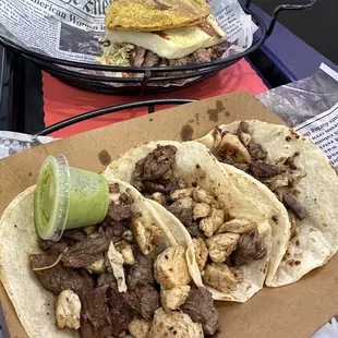 Mix tacos . Chicken and steak