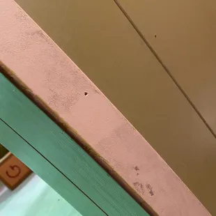 Took a wipe and cleaned a small section. It took half a second to clean.