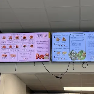 menus on the wall of a restaurant
