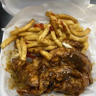 Jamaican Jerk Chicken and French Fries.