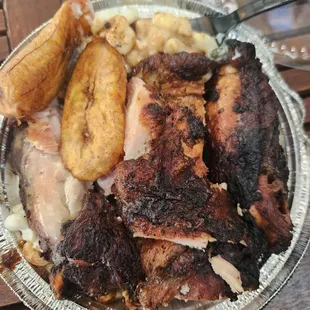 PEPPA&apos;S JERK CHICKEN, plantain, mac salad w oxtail gravy. OMGeeeee!