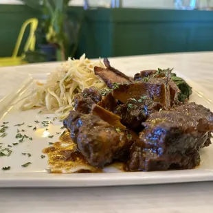 Stew Oxtail with steam cabbage, spinach and fried plantain