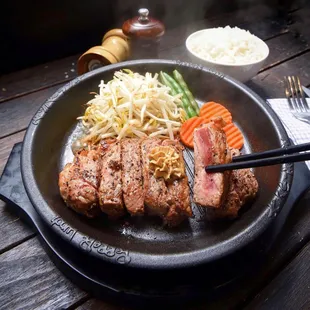 New York Pepper Steak (all steaks come with rice on the side)