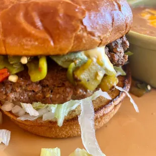 Skip the line at Sparky's. This green chile cheese burger is legit.