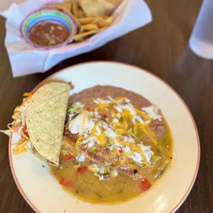 The perfect lunch. From al a carte menu:  smothered relleno with chicken, tacos and beans.