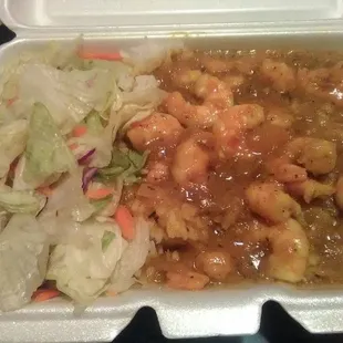 Curry shrimp with salad.