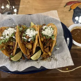 Tacos al pastor with our spicy salsa
