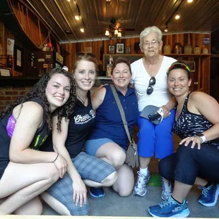 a group of women posing for a picture
