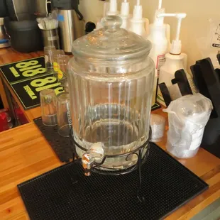 a glass jar on a kitchen counter