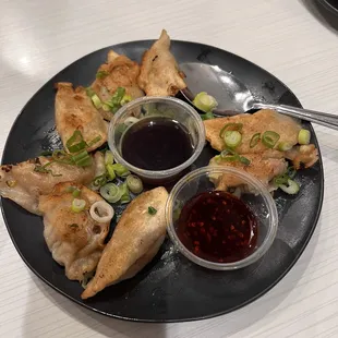 Perfectly pan fried pork dumplings.  We got them complimentary today as part of their 4th of July perk!