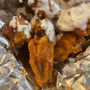 Raw chicken, dry when it was supposed to to be honey bbq sauce nasty wings