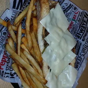 Steak philly with extra cheese,  onions, bell peppers, jalapeño and mushrooms.  Fire balled it as well.