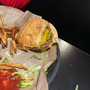 Kids cheeseburger disguised as a double cheeseburger. Lol