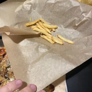 Remnants of ice cold French fries