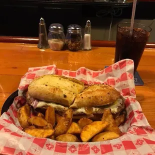 Steak hoagie and potato wedges