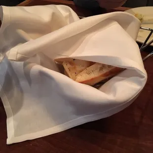 The bread basket comes with a wonderful warm tomato sauce. Delicious!