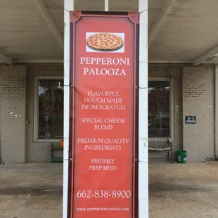 a sign in front of a restaurant