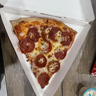 Pepperoni pizza slice