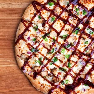 a pizza on a wooden table