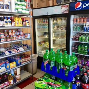 a variety of sodas and soft drinks