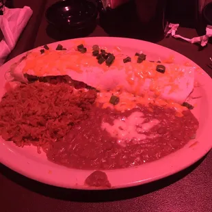 Fajita Burrito (chicken, white queso, refried beans and rice)