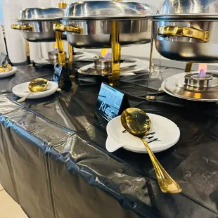 a variety of food items on a buffet table