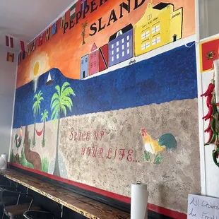 a mural on the wall of a restaurant
