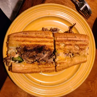 Pick your side correctly, one has filling. Torta poor construction at Peppers Mexican Grill
