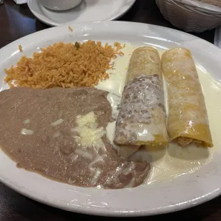 2 chicken enchiladas, rice and beans