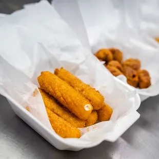 two baskets of fried fish