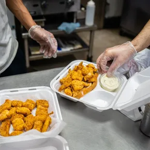 two people preparing food