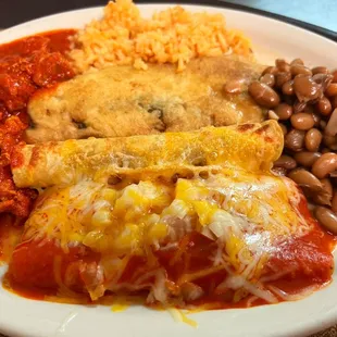 Combination #3: Red Chile Cheese Enchilada, Rolled Beef Taco, Chile Relleno, Beans, Rice, and Chile con Carne
