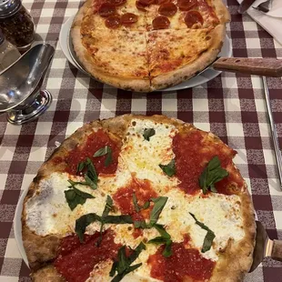 Yummy baby pizzas! One Margerita and one regular cheese half pepperoni. The margarita was better!