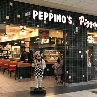 the entrance to peppino&apos;s pizzeria