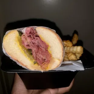 Pastrami Grinder with fries