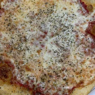 Pizza with butter basil flakes, not pepper!