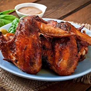 a plate of chicken wings