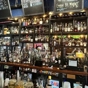 shelves of liquor and liquor bottles