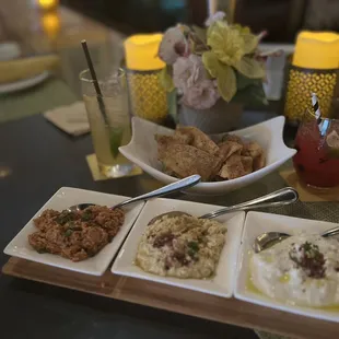 Trip Dip sampler-home made delish hummus, roasted eggplant  yogurt dip, and roasted walnut Muammara! So goooood!!!!