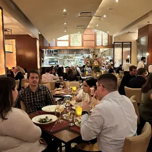 a group of people sitting at a table